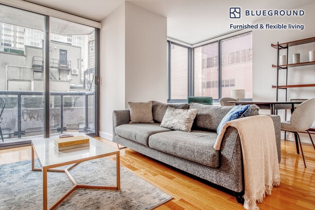 Building Photo - 235 W 48th St Unit SI FL18-ID1208