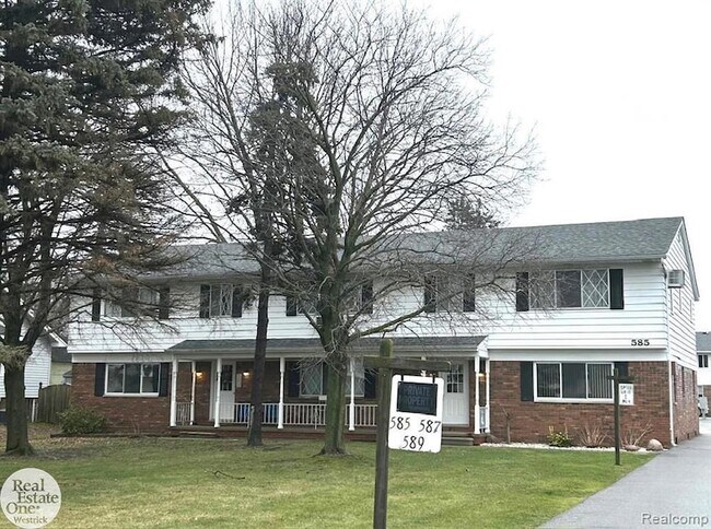 Building Photo - 587 Pointe Tremble Rd Unit 5