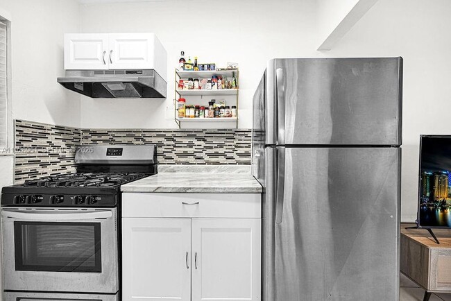 Photo - 7625 Harding Ave Unit 1