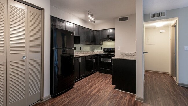 Prepare meals with ease in thoughtfully designed culinary spaces. - Amberlake Village