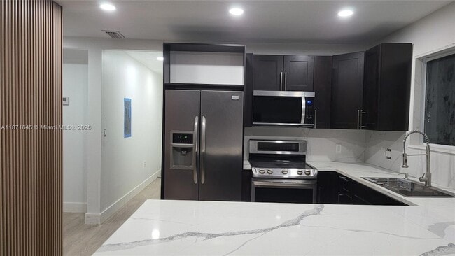 Building Photo - 2310 NW 103rd St