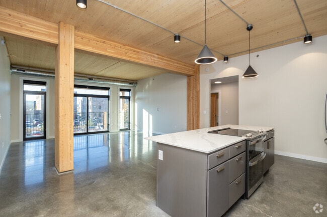 2BR, 2BA - 1,336SF - Kitchen/ Dining Room - The Dakota Flats at Cherapa Place