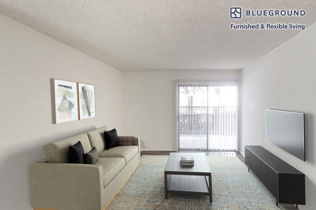 Building Photo - 6700 Warner Ave Unit FL2-ID5367A