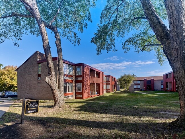 Welcome home to North Crossing Apartments in Willow Grove, PA — featuring spacious courtyards, red brick architecture, and a convenient on-site leasing office. - North Crossing