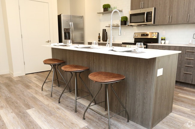 3BR, 2BA - 1,080 SF - Kitchen - Edge on Four Apartments