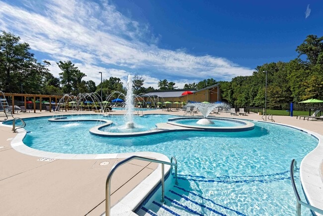 Swimming Pool with Lazy River - Rollins Park Apartments