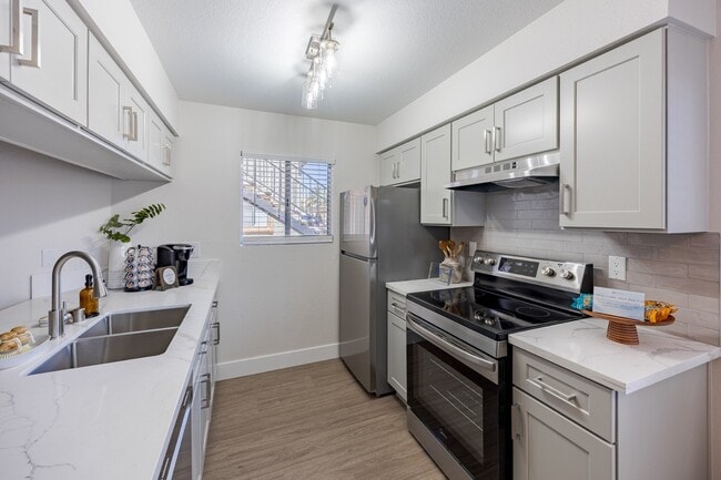 Updated Kitchen at Sunset Winds Apartments in Henderson, NV 89014 - Sunset Winds Apartments