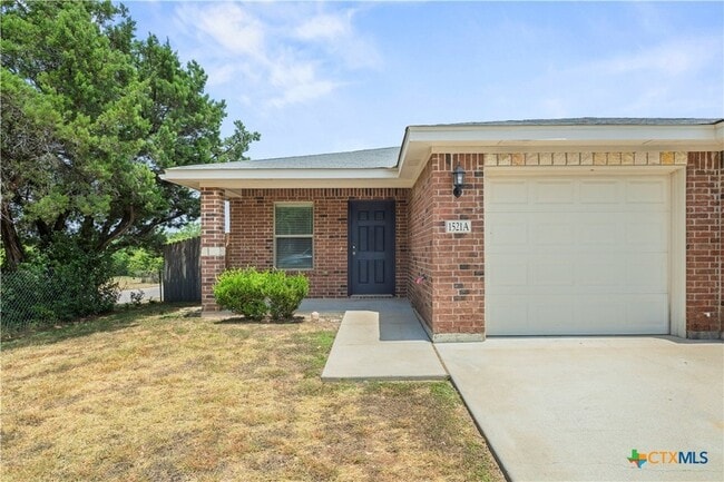 Building Photo - 1521 Aztec Trce Unit A