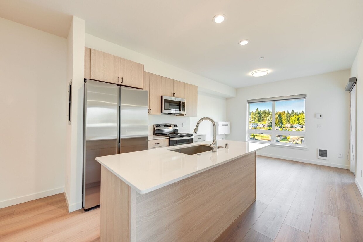 Floor Plan - Work. Lounge. Live. The 1-Bedroom + Den Advanta...