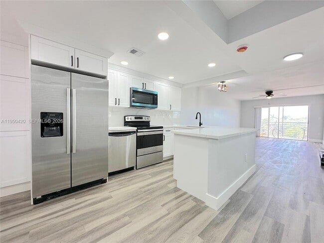 Photo - 3110 N Pine Island Rd Unit 408