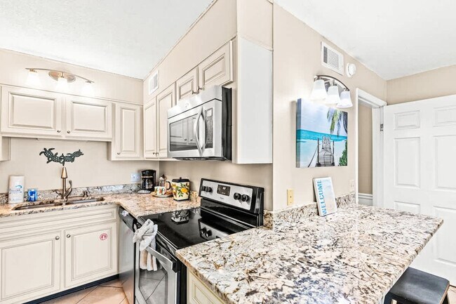 Photo - 8743 Thomas Dr Unit SI FL8-ID1354978P