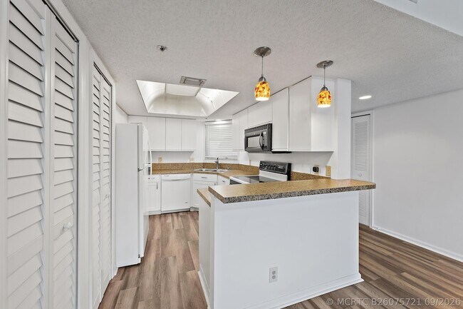 Photo - 700 Uno Lago Dr Unit 404