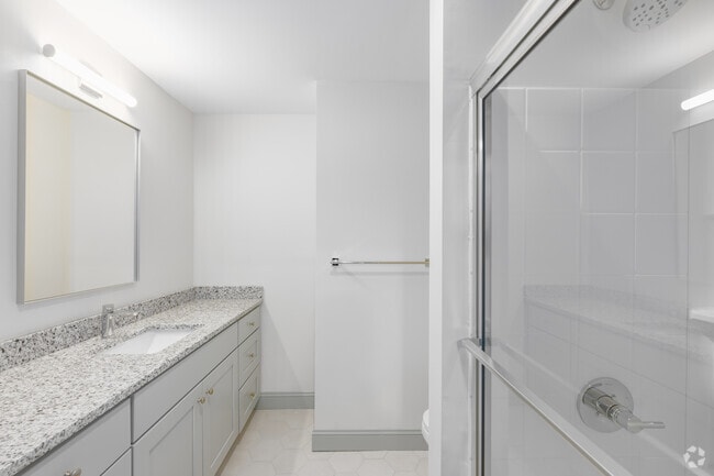 3BR, 1.5BA - 1,139SF - Primary Bathroom - Sacred Heart Lofts