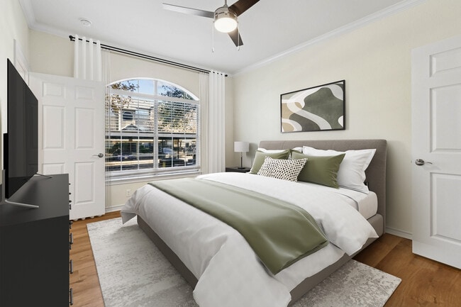 Renovated Package I bedroom with hard surface flooring - eaves North Dallas