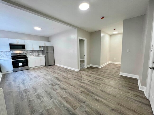 Building Photo - 6002 Hudson Ave Unit 1A