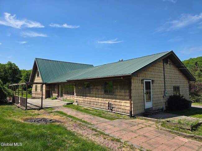Building Photo - 1462 W Fulton Rd Unit 1