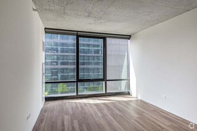 1BR, 1BA - 689SF - Living Room - Coeval