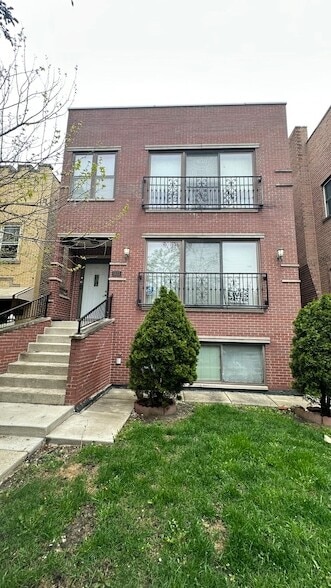 Building Photo - 5523 N Sawyer Ave Unit G