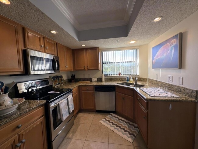 Photo - 700 Uno Lago Dr Unit 305