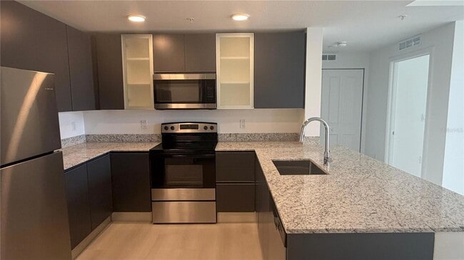 Photo - 5587 Millenia Blvd Unit 213