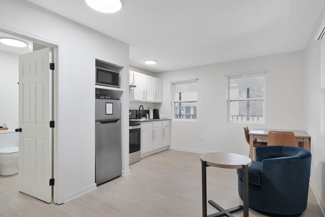 Sitting Area & Kitchen - Redamo Suites