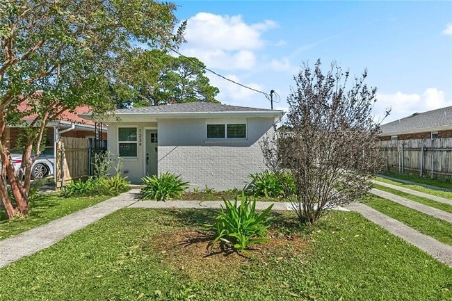 Building Photo - 1239 Helios Ave