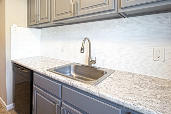 Modern Finishes with Tile Backsplash - Capital at St. Charles