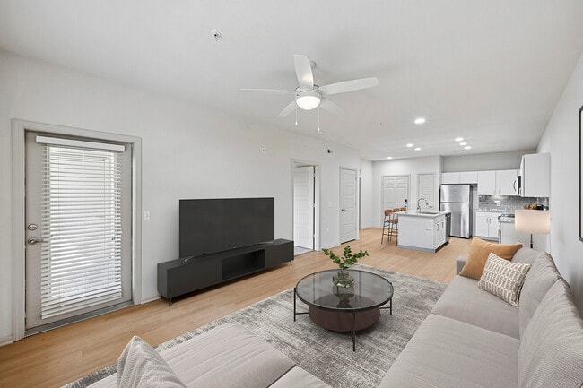 Renovated Package I living room with hard surface flooring - Avalon Denver West