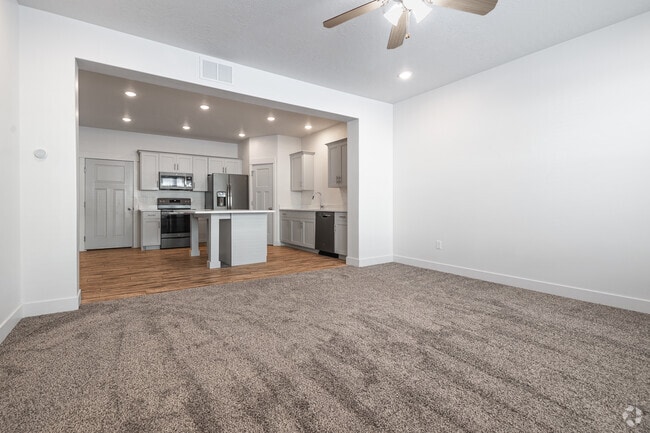 3BR, 2.5BA - 1,520SF - Living Room/Kitchen - Smithfield Station Townhomes