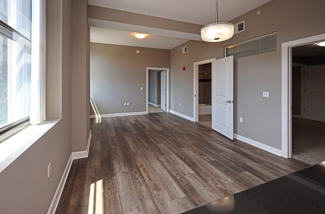 Model - Living Area with All New LVT Hard Surface Flooring - The Residences At Hanna