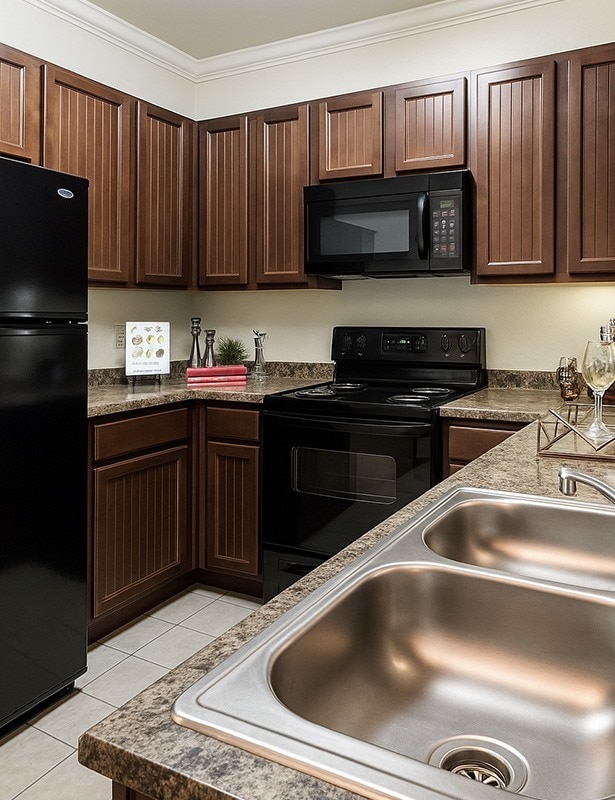 Classic homes include black appliances - Glenhaven at Star Ranch