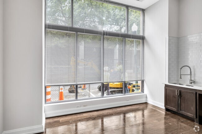 1BR, 1BA - 563SF - Harvard - Living Room, Kitchen - The Law Building