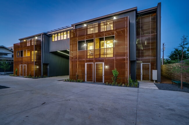 West facing units all have walkout balconies that are screened in with perforated Corten metal. This diffuses afternoon sun and creates an amazing outdoor room. - Bardo Lofts