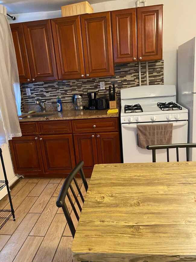 Photo - 708 E 44th St Unit FL2-ID1039013P