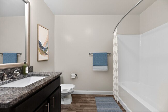 Elevate your lifestyle at Mansions at Delmar, an Eagle Rock Community. Enjoy modern bathrooms featuring sleek fixtures and stylish finishes designed for comfort. Ready to make this your new home? Contact us today for more information! - Mansions at Delmar, an Eagle Rock Community