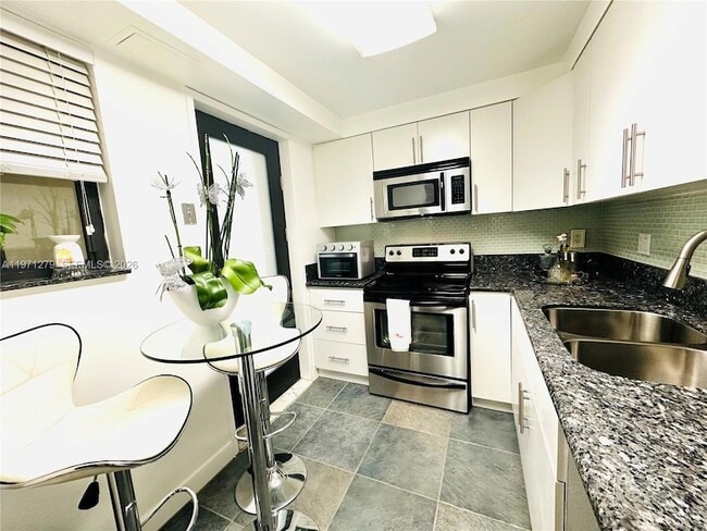 Photo - 301 Golden Isles Dr Unit 114