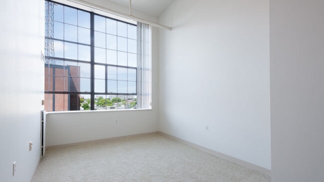 Carpeted Bedroom - Lofts at Kendall Square
