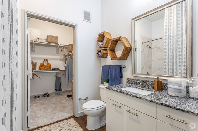 1BR, 1BA - 712SF A1 - Bathroom and Closet - Woodlands at the Preserve