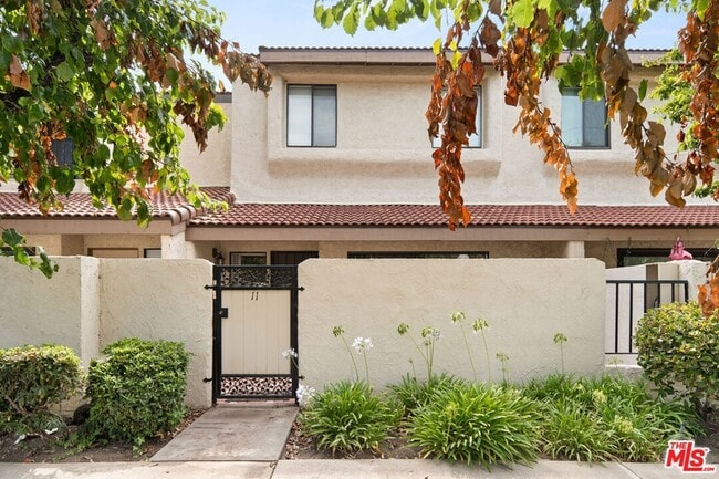 Building Photo - 6021 Lindley Ave