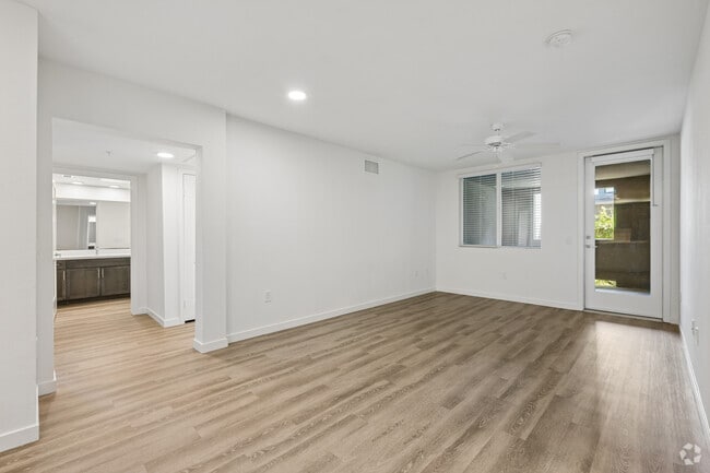3BR, 2BA - 1464SF - Living Room - Wagon Wheel Town Square