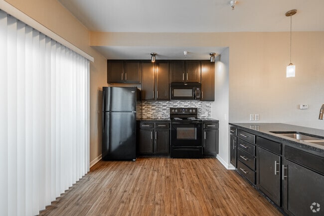 2BR, 2BA - 1,087SF - Loft - Kitchen - SunSTONE at Fox Ridge