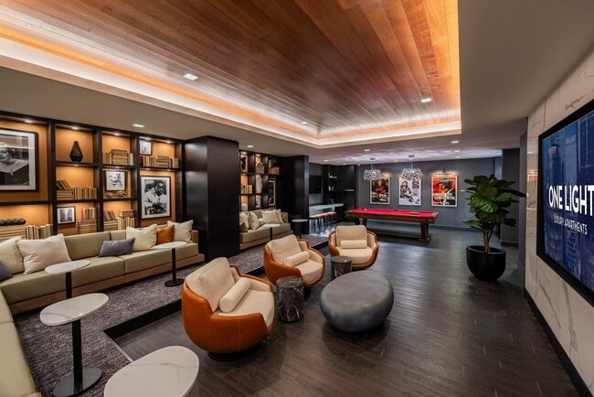 The refreshed theater and social room at One Light Luxury Apartments - One Light Luxury Apartments
