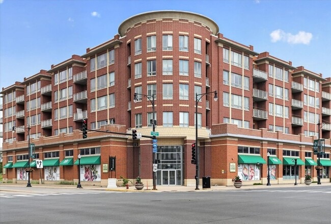 Building Photo - 6000 N Cicero Ave Unit 302