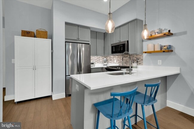 Building Photo - 3225 Sherman Ave NW Unit 1