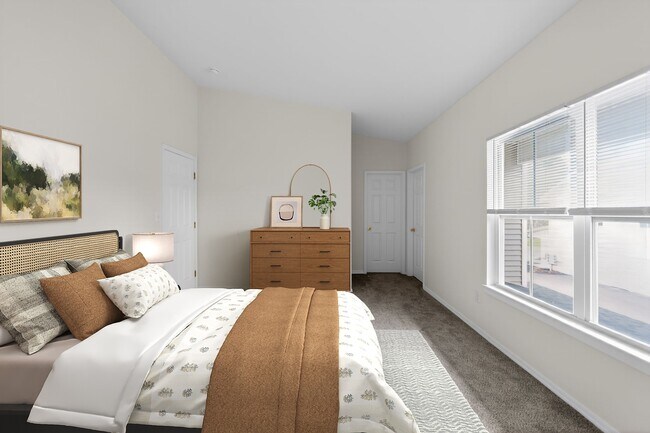 Welcome to Mansions at Delmar, an Eagle Rock Community, where modern design meets comfort. This inviting bedroom features natural light, stylish furnishings, and ample space for relaxation. Schedule a tour today and see your future home! - Mansions at Delmar, an Eagle Rock Community