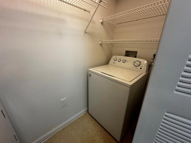 Building Photo - 3615 NW Mediterranean Ln Unit 13205