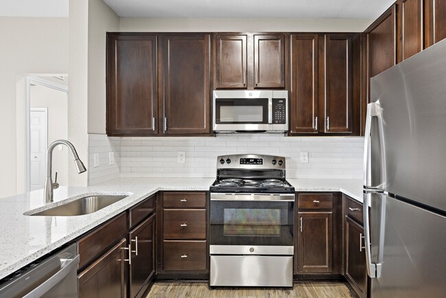 Upgraded appliances - a Cooks dream! - Las Brisas Apartment Homes