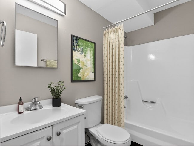 Transform your daily routine in the stylish bathroom at The Flats at Talcott, an Eagle Rock Community. Enjoy modern finishes and a soothing ambiance designed for comfort. Come see your new home today and elevate your living experience! - The Flats at Talcott, an Eagle Rock Community