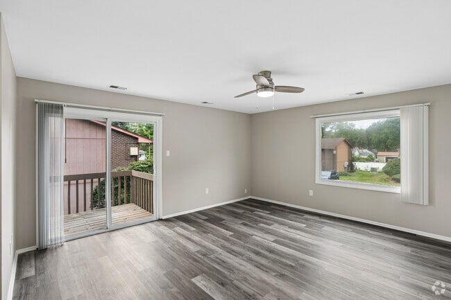 2BR, 1BA - 770SF - Living Room - Woodside Village Apartments