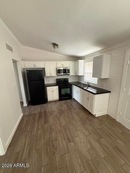 Building Photo - 2308 N 28th Pl Unit 3